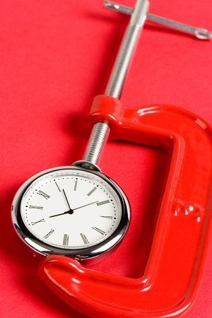Vise Grip and Clock, Concept of busyの写真素材