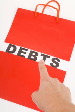 Shopping Bag and word debts concept of Financial difficultyの写真素材