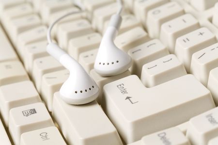 Headphones and keyboard, concept of digital musicの写真素材