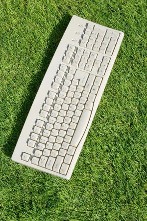 Computer Keyboard and lawn, concept of Freedom, Environment Protectionの写真素材