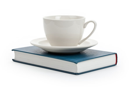 White Coffee Cup and book close upの写真素材