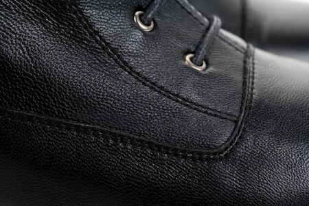 Black Leather shoes close upの写真素材