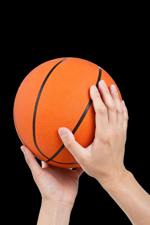 Orange Basketball with black backgroundの写真素材