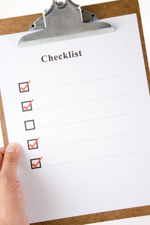 Checklist and Clipboard with white backgroundの写真素材