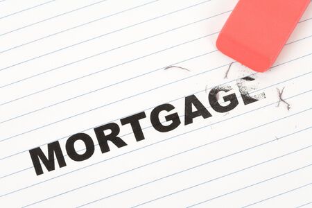 eraser and word mortgage, concept of Reduce Mortgage Debtの写真素材