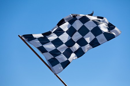 Checkered Flag and blue skyの写真素材