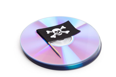 CD, DVD and Pirate Flag, concept of Piracy