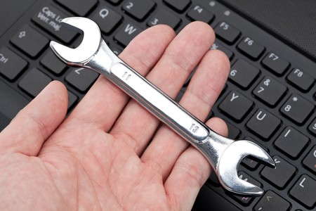Computer Keyboard and Wrench, concept of IT Supportの写真素材