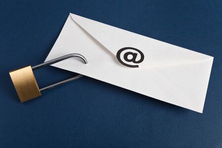 Envelope with @ Symbol and lock, concept of E-Mail Securityの写真素材