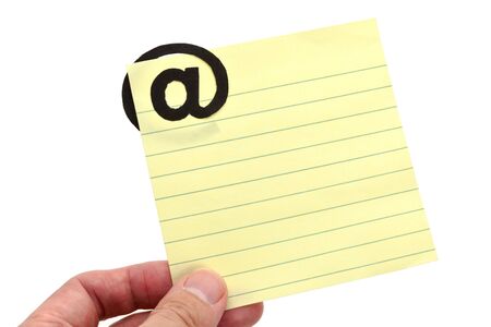 hand hold Note Pad with 'at' Symbol, e-mail conceptの写真素材