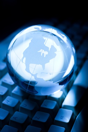 Blue Globe and Computer Keyboard for background


の写真素材