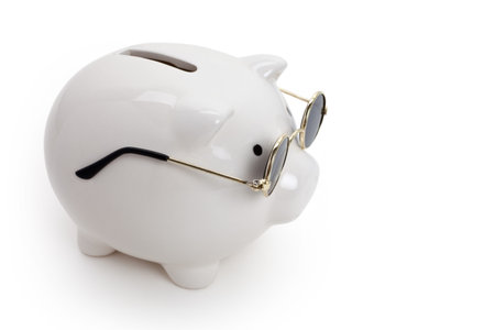 Piggy Bank and Sunglasses , concept of savingsの写真素材