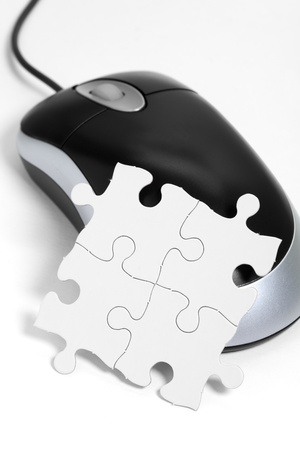 computer mouse and Puzzle, business concept の写真素材