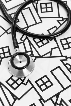 Stethoscope and House, concept of Real Estate Problemsの写真素材