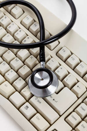 Stethoscope and Computer Keyboard, concept of Healthcare And Medicineの写真素材