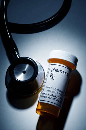 Pill Bottle and Stethoscope, concept for Healthcare And Medicineの写真素材