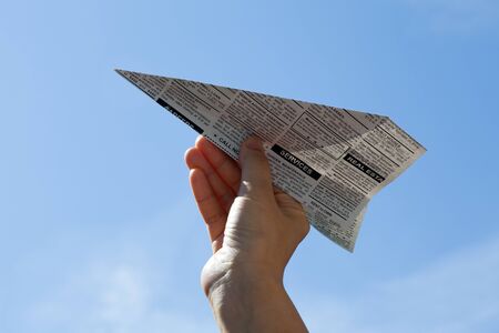 Fake Newspaper Airplane, Classified Ad, business concept.の写真素材