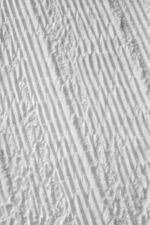 snow with tracks for backgroundの写真素材