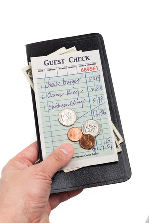 Guest Check and dollar, concept of restaurant expense.の写真素材