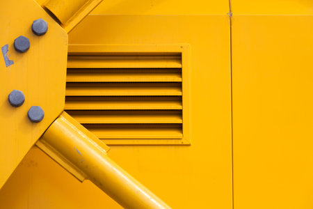 Yellow Metal Machine Part for backgroundの写真素材