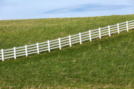 White Fence and Pasture for backgroundの写真素材