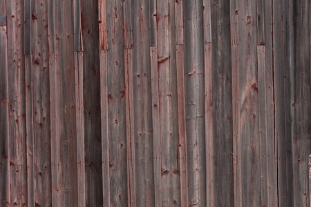 Shingles wall on a very old wood buildingの写真素材