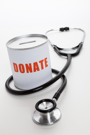 Stethoscope and Donation box, concept of Charity work の写真素材
