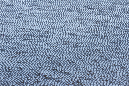 Patterns left in the sand by the out going tide