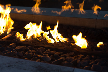 flame of fire with dark backgroundの写真素材