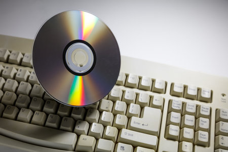 computer keyboard and DVD disc