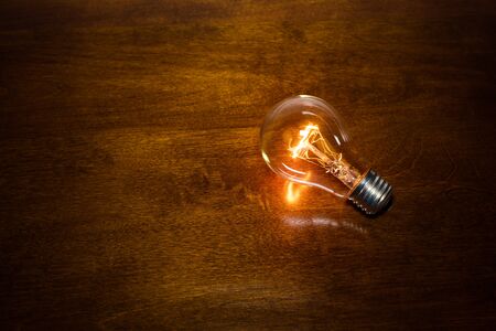light bulb on dark background, concept of creativity.の写真素材