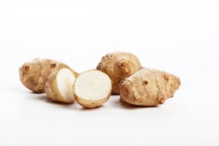 Jerusalem artichoke with white background, close upの写真素材