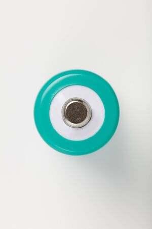 green battery positive with white background, close upの写真素材