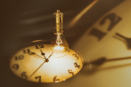 Light bulb and clock, concept of idea.