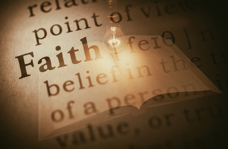 fake dictionary, definition of the word faith.の写真素材