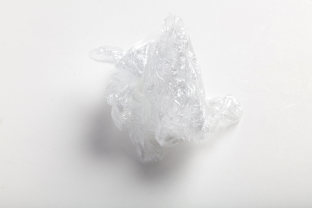 wrapping plastic transparent food film on white background.の写真素材