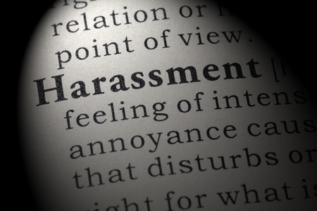 Fake Dictionary, Dictionary definition of the word harassment. including key descriptive words.の写真素材