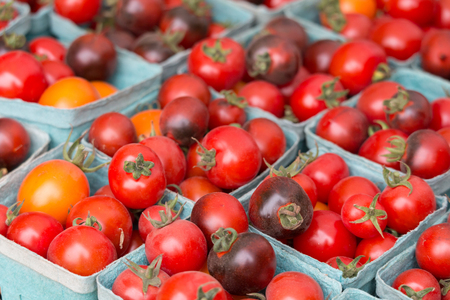 Fresh tomato from garden in the market place.の写真素材