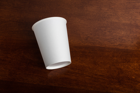 a White paper coffee cup on table.の写真素材