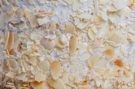 cream walnut cake background texture, close up.の写真素材