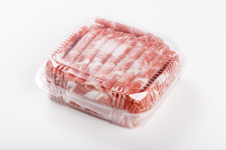 Raw freshly prepared sliced lamb for hot pot.の写真素材