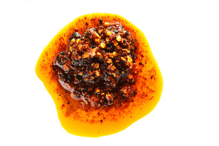 Red hot chili pepper sauce, food ingredient.
