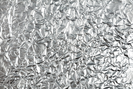 Aluminum foil roll for background, close up.の写真素材
