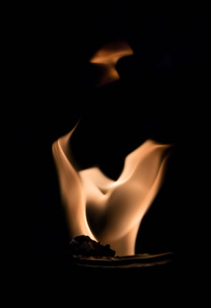 Fire flames abstract on black backgroundの写真素材