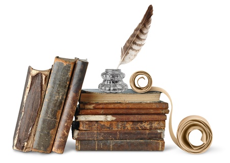 Old books,  inkstand and scroll isolated on whiteの写真素材