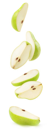 Green pears in the air. Pieces of green isolated on white backgroundの写真素材