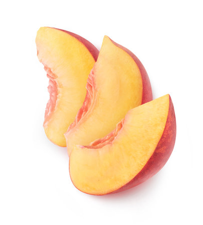 Isolated peach slices. Three pieces of peach fruit in a row on top of each other isolated on white backgroundの写真素材
