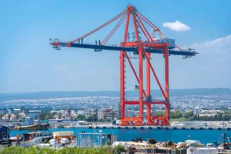 Ship to shore container crane in cargo terminal of Limassol port, Cyprusの写真素材