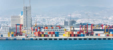 Container yard with straddle carriers and other facilities in cargo terminal of Limassol port, Cyprusの写真素材