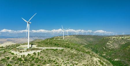 Rows of wind generators on top of the hills, Oreites wind farm in Cyprus